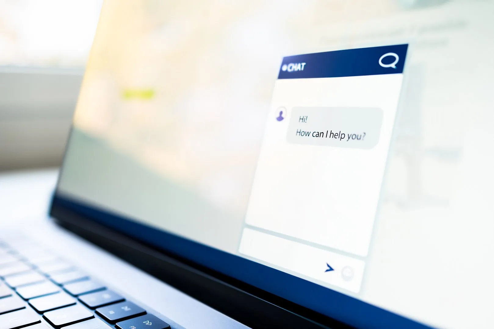 Chat with customer. AI chatbot. Support contact help center website on laptop computer screen. Live helpdesk service with bot or human. Online conversation with agent. Automated message.